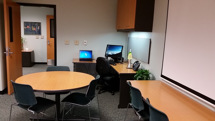 Workstation and conference tables in 1253B.